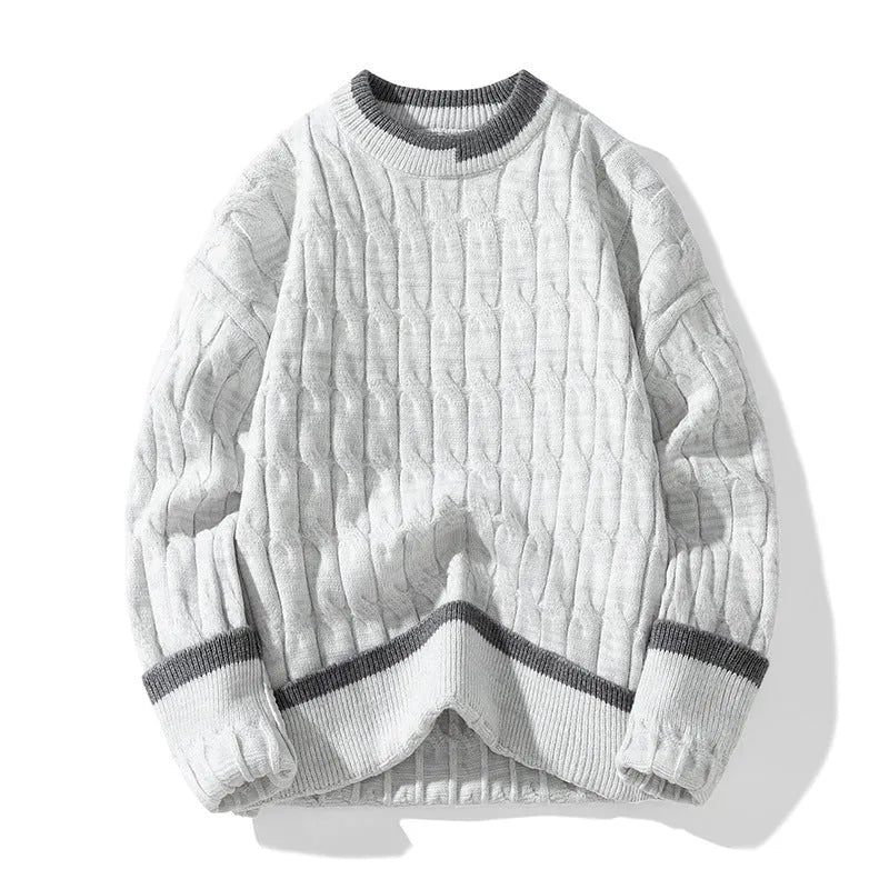 Two loose fit men's long sleeve pullover sweaters folded, shown in light blue and grey colour options.