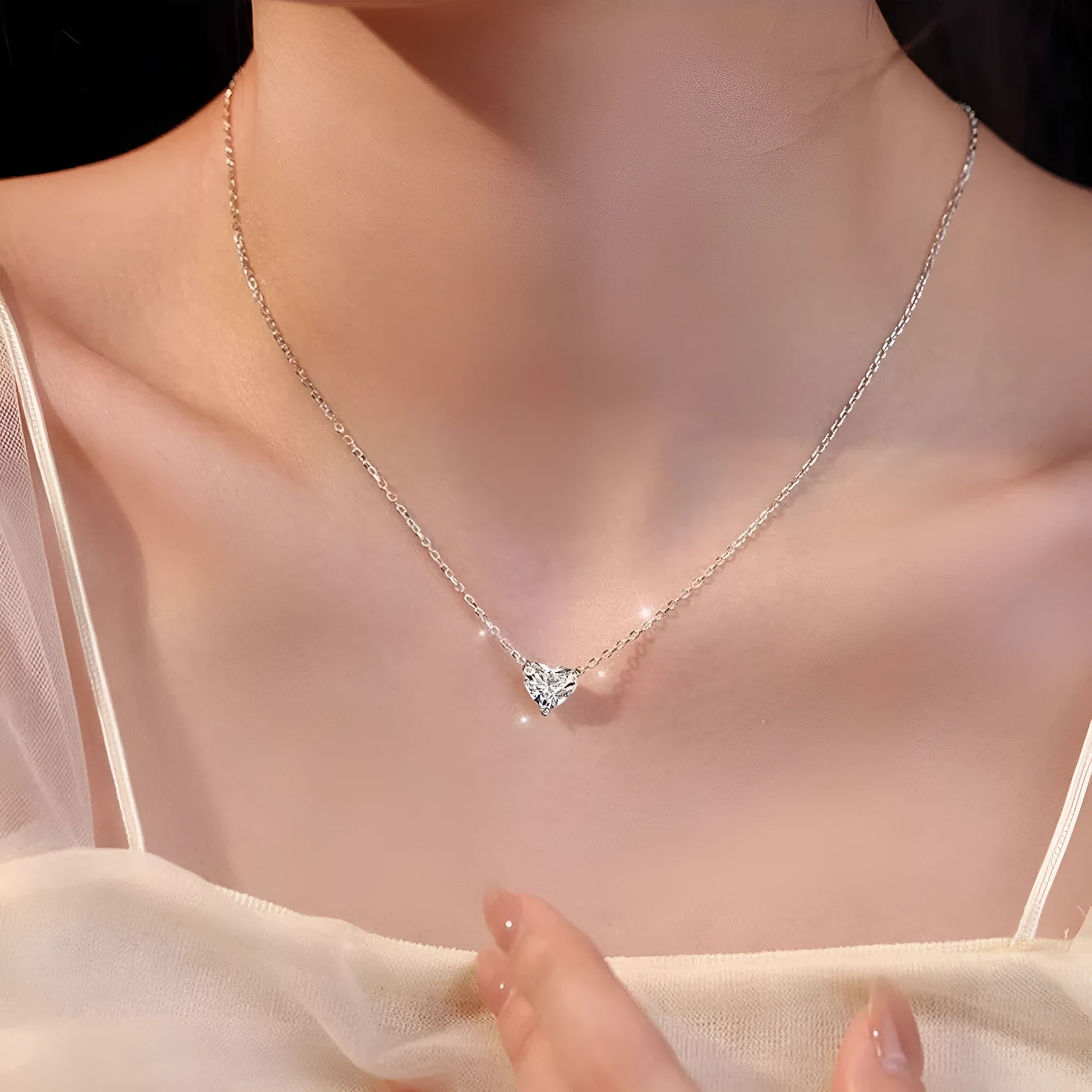 Women's silver heart necklace with minimalist copper pendant on chain
