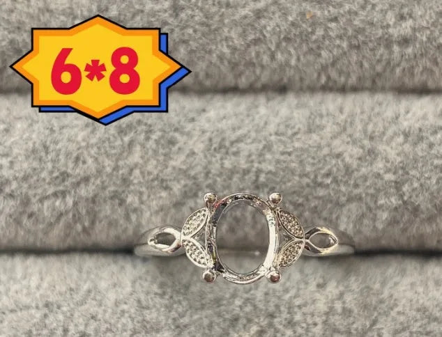 Oval denier ring with open mouth design and five-pointed star detail on electroplated copper