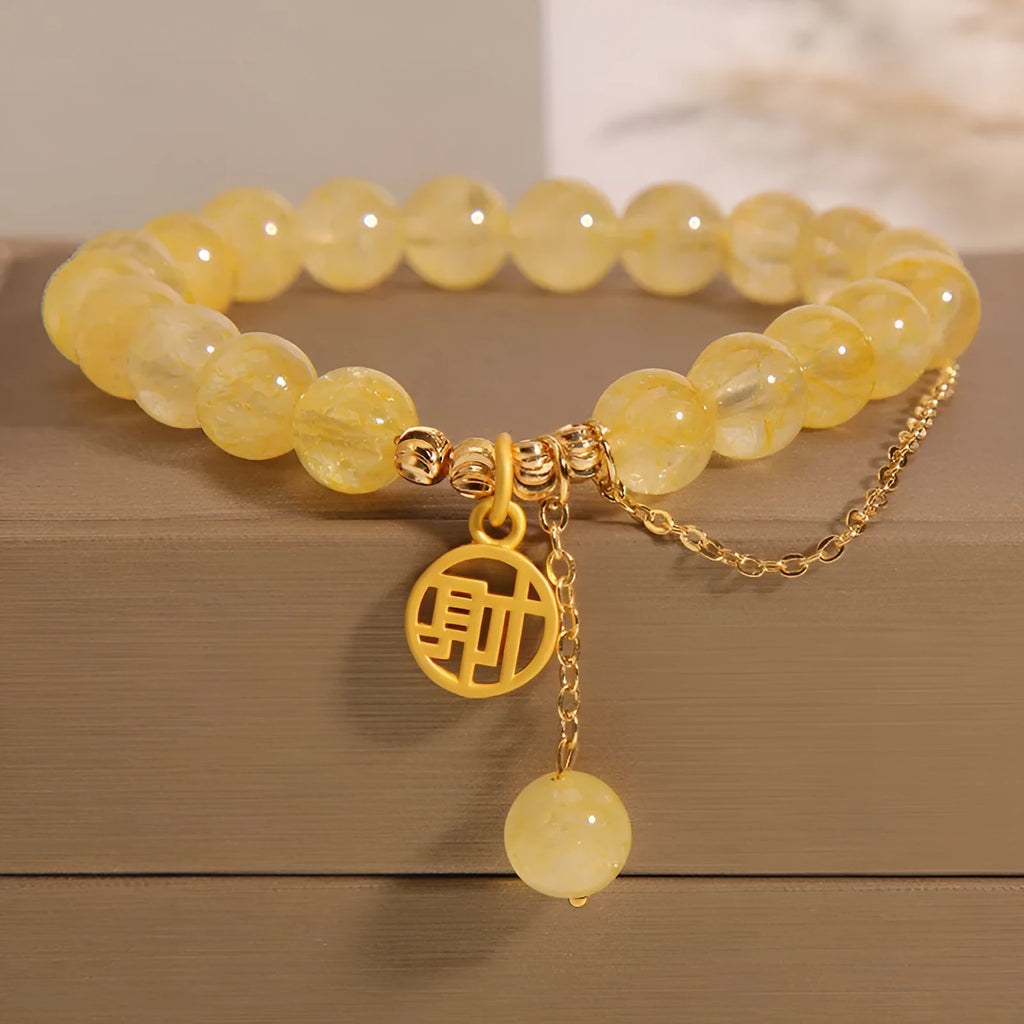 Natural citrine bracelet with Chinese character tassel in gold electroplated finish