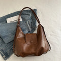 Black leather PU women's single-shoulder backpack with textured finish and horizontal square shape