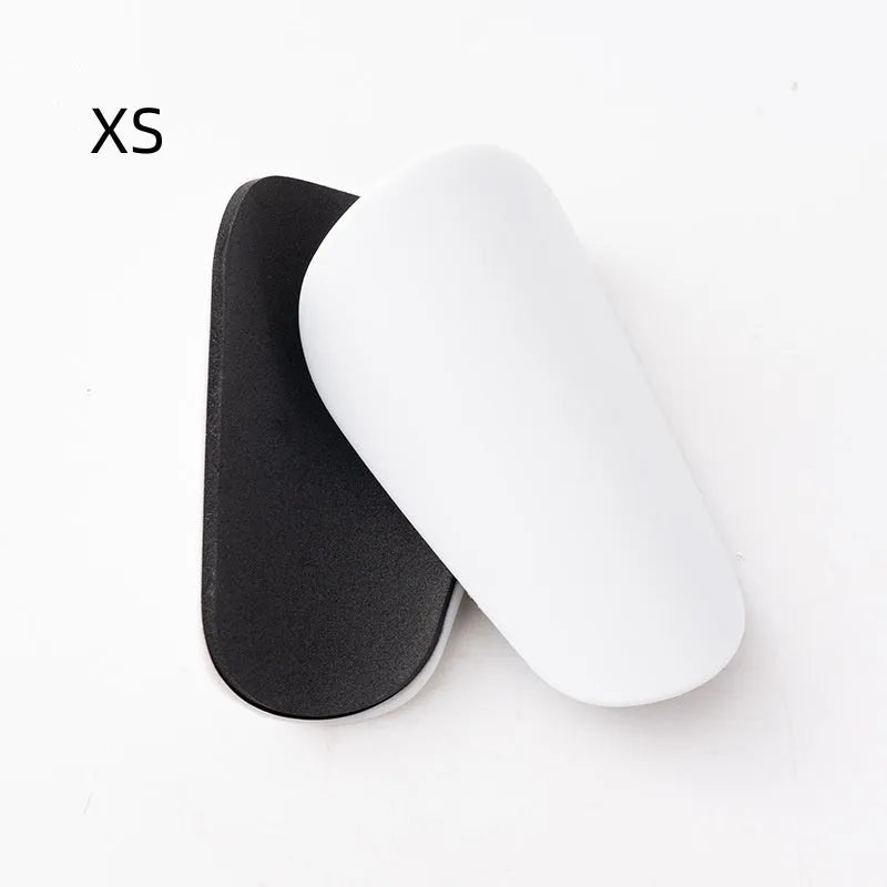 PU mini shin guards in black, white, red and blue for football and outdoor sports