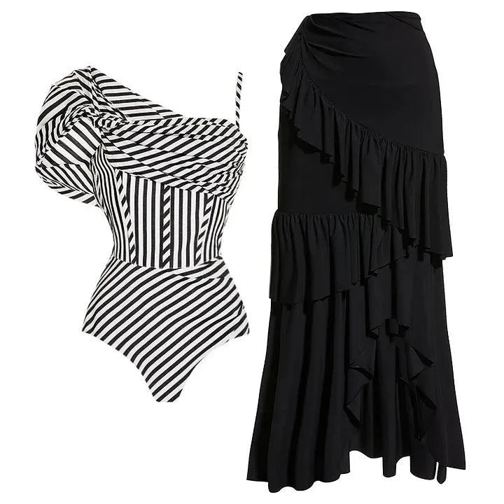 Women's striped one-piece swimsuit with ruffle detail on polyester fabric.