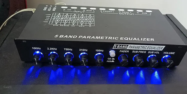 Black car audio EQ tuning body with 6-channel output and 7-band frequency controls for subwoofers