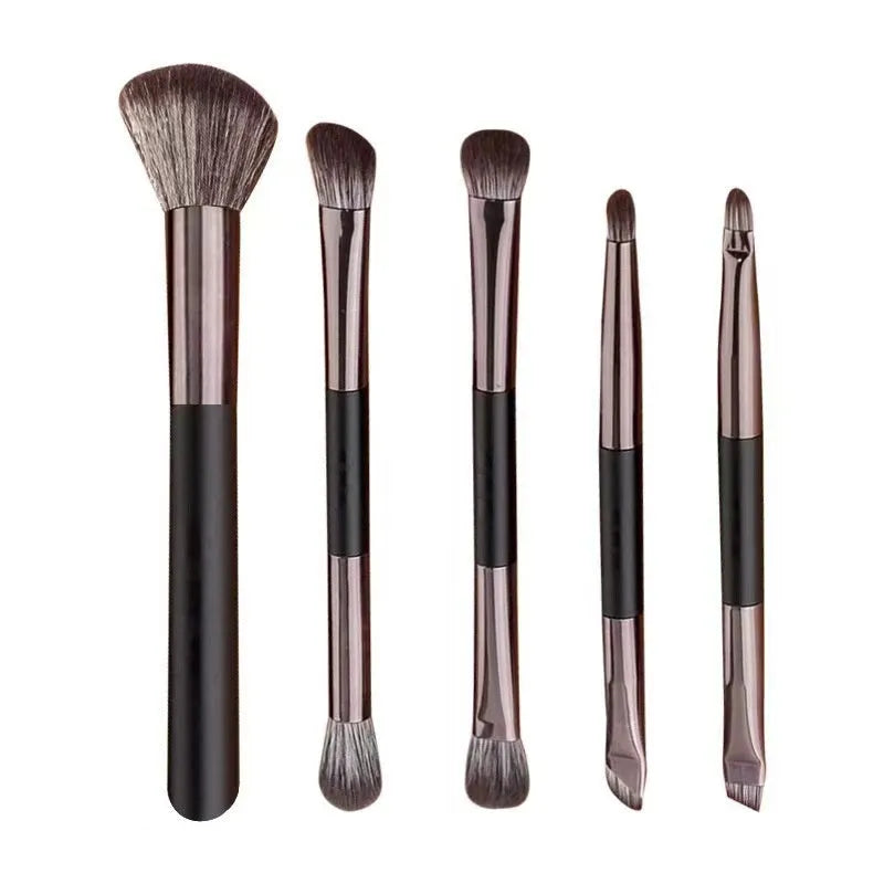 Makeup brush set with mirror case showing silver and gold brush options with artificial fibre hairs
