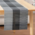 Modern PVC non-slip dish mat in gradient bamboo pattern placed in a kitchen sink.