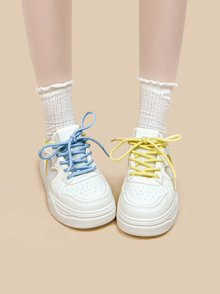 Meow Rabbit Sea Salt Cheese coloured mesh sneakers with lace-up closure and thick rubber sole for children and youth.