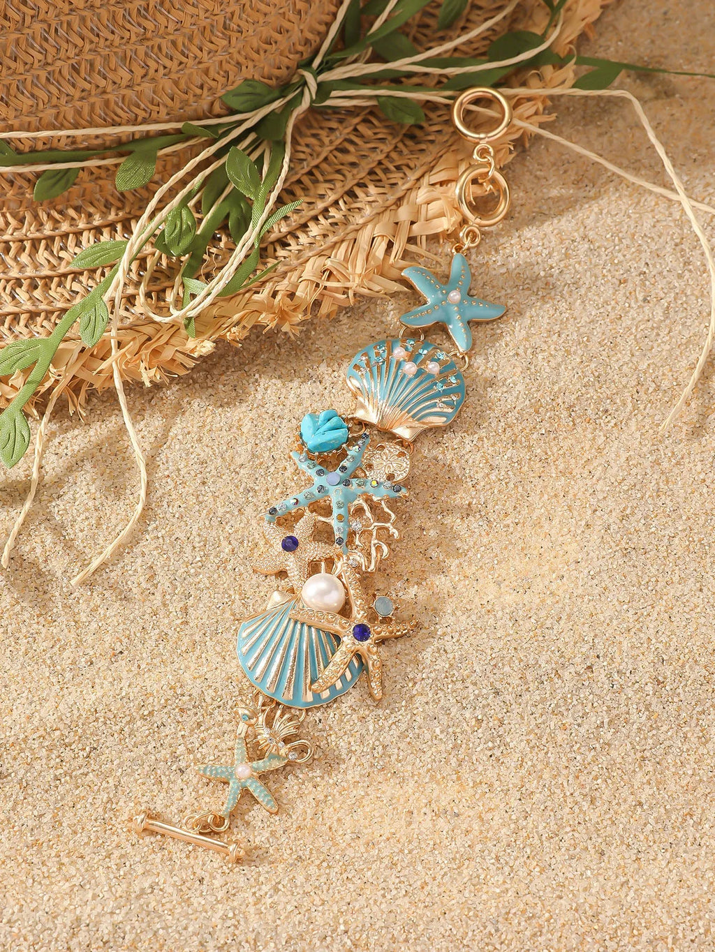 Women's alloy rhinestone bracelet featuring marine anchor and starfish design in coastal colours