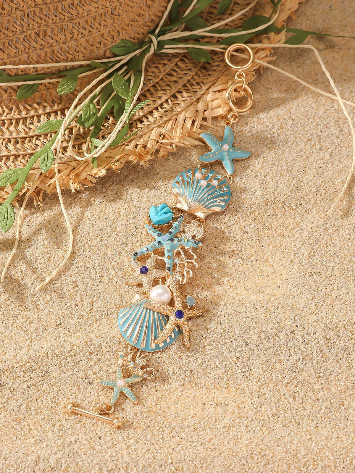 Women's alloy rhinestone bracelet featuring marine anchor and starfish design in coastal colours