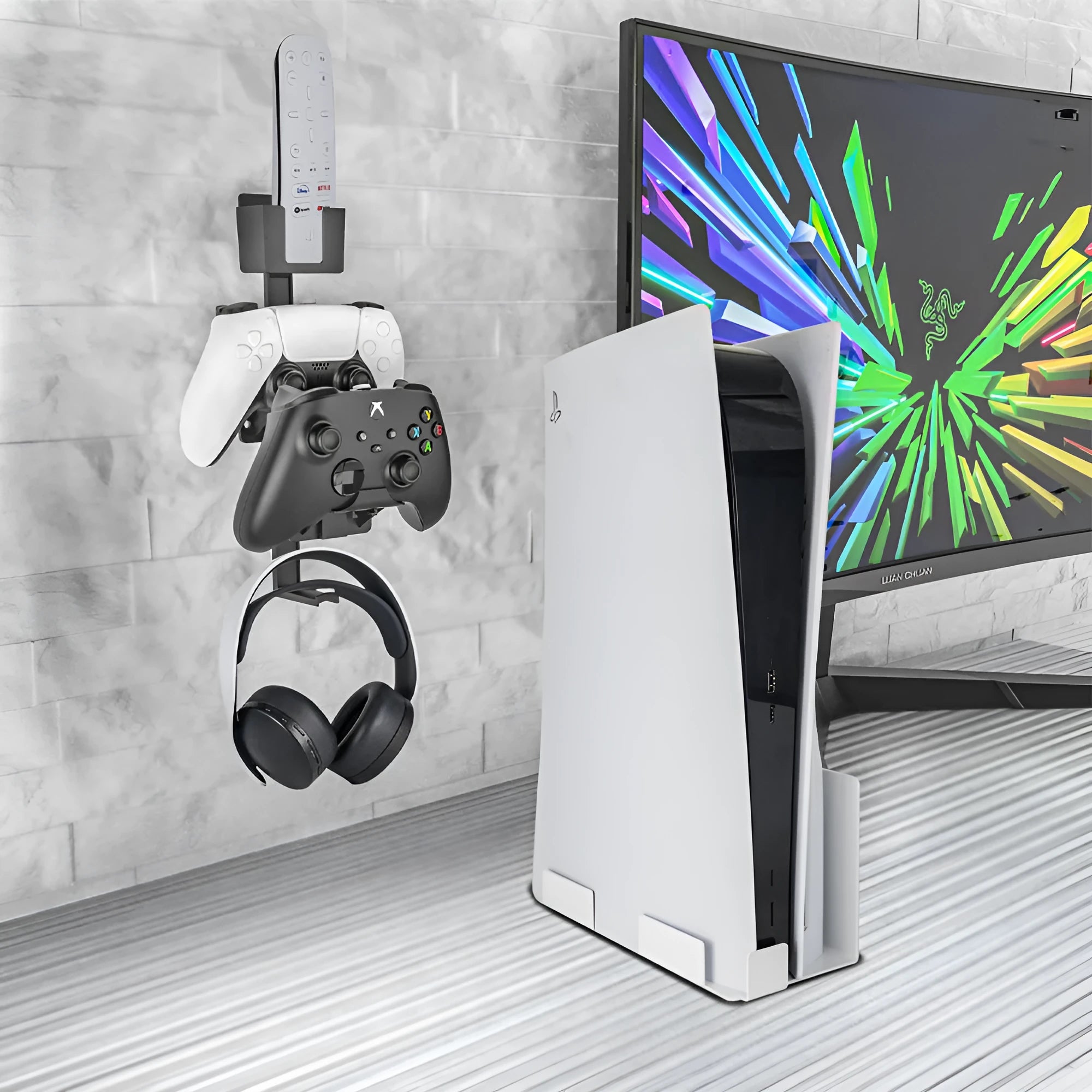 White and black ABS wall-mounted storage hooks holding gaming controllers and headphones