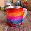 Hand-painted resin coffee cup with book mark decoration, 13cm tall decorative mug