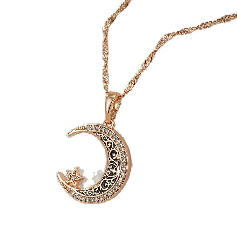 Rose gold necklace with zircon star moon pendant and enamel detailing on adjustable water wave chain
