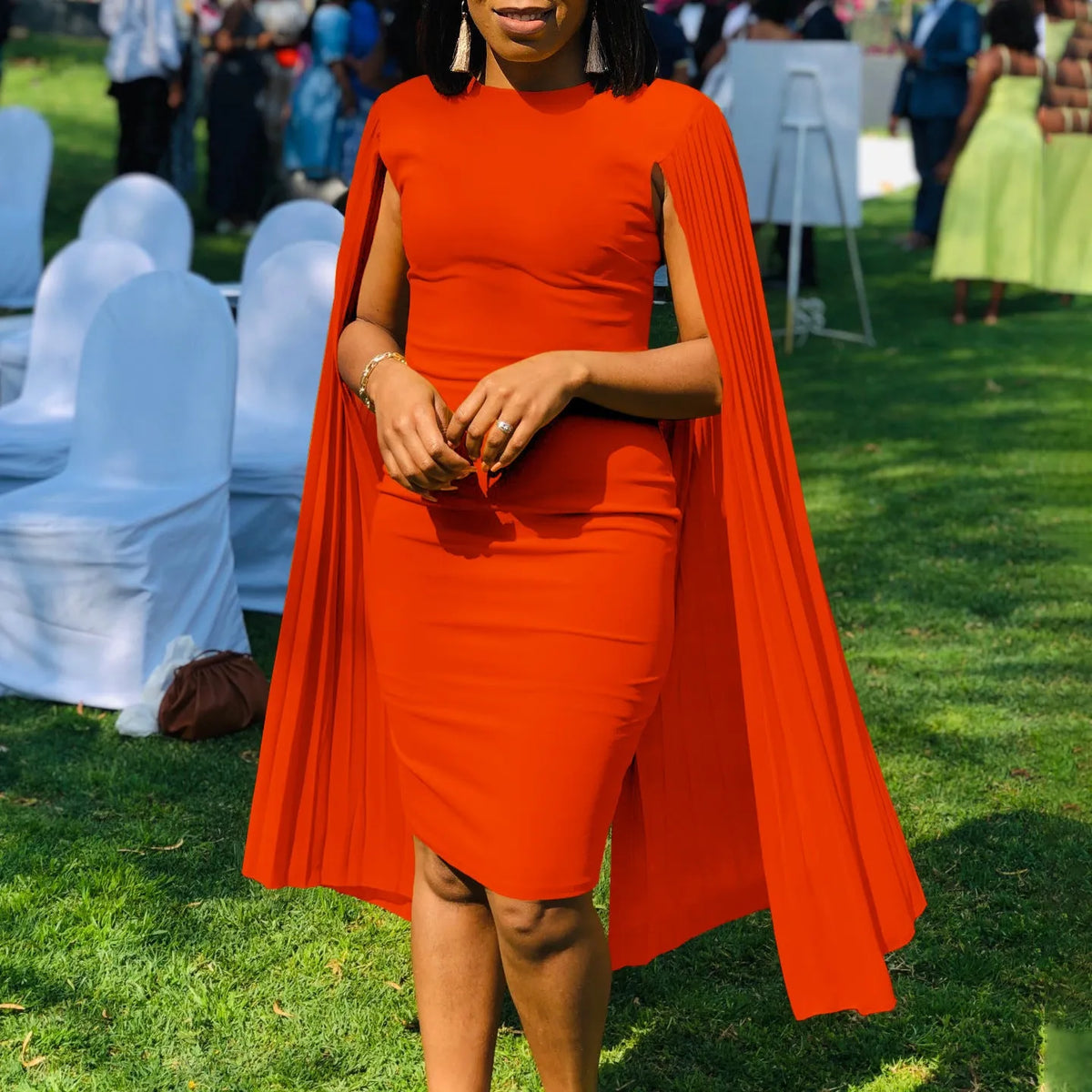 Women's long sleeve evening gown with pleated shawl collar and high waist in a choice of colours.