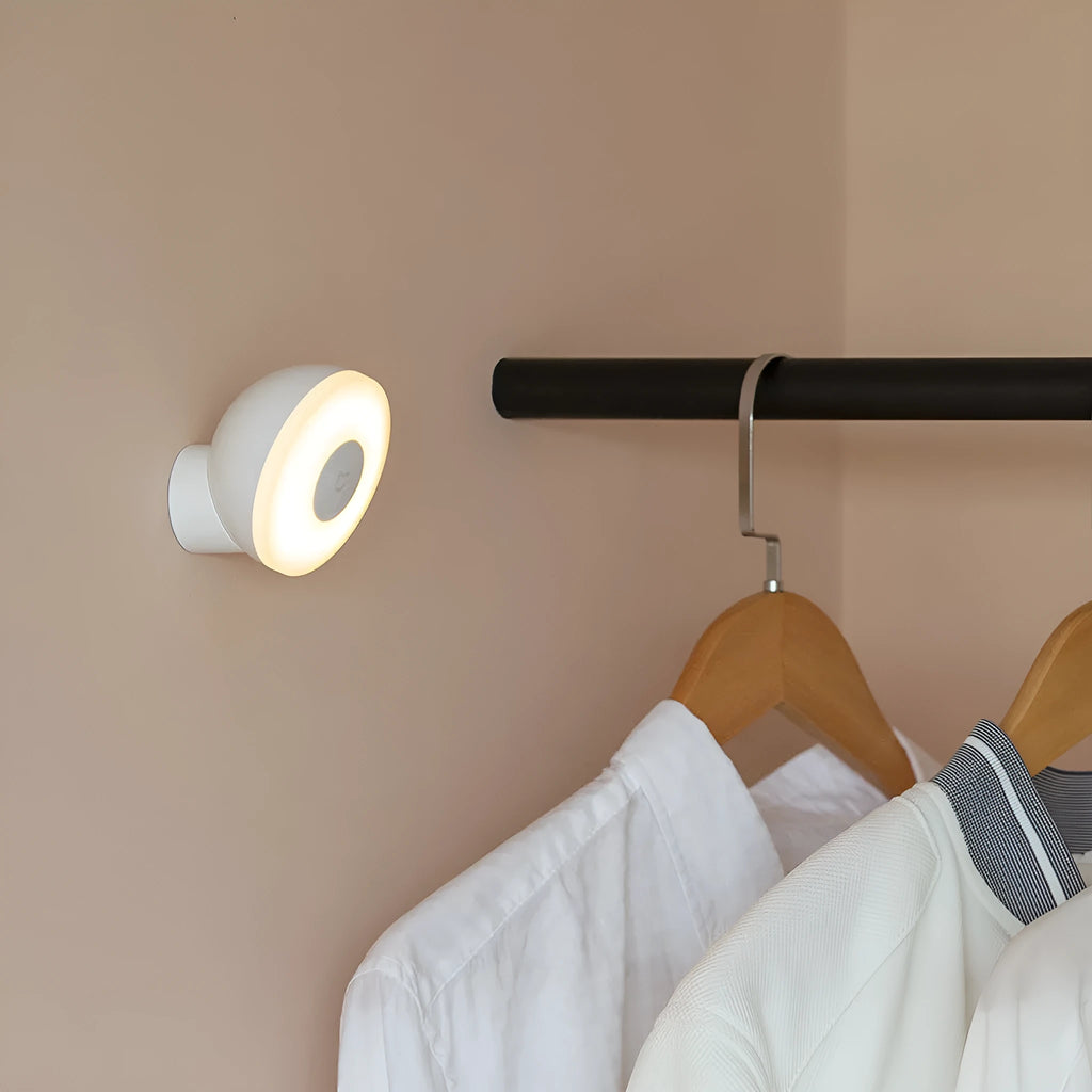 White modern bedside table lamp with Bluetooth and human body sensor.