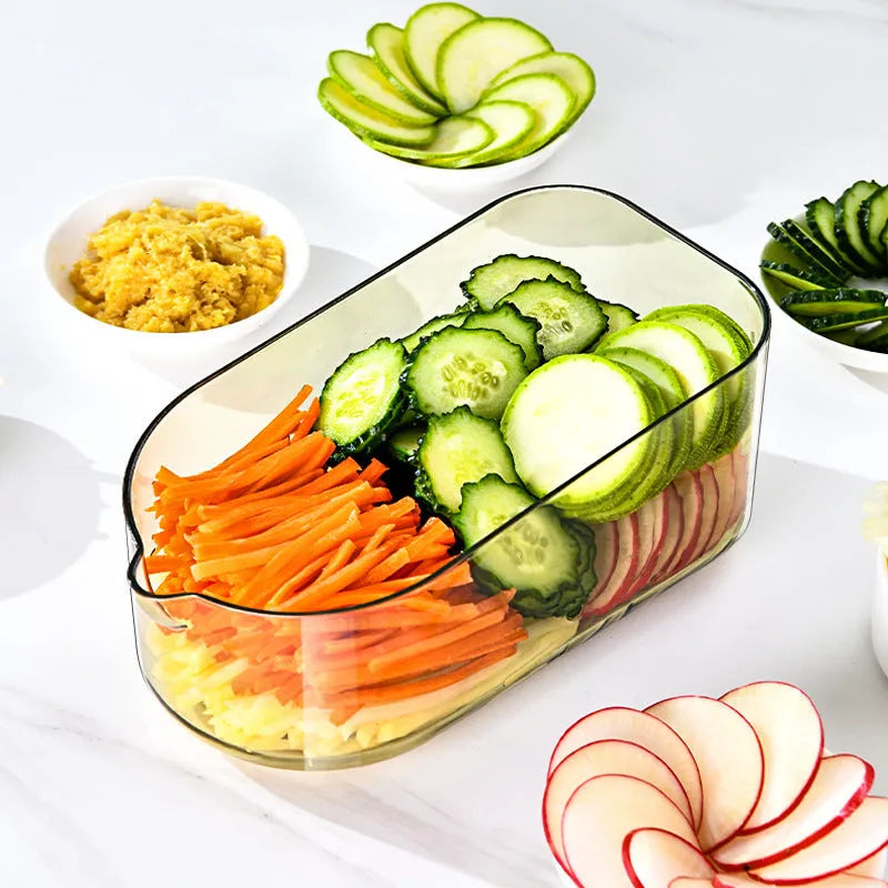 Transparent green vegetable cutter with stainless steel blades and 1.5L chopping box