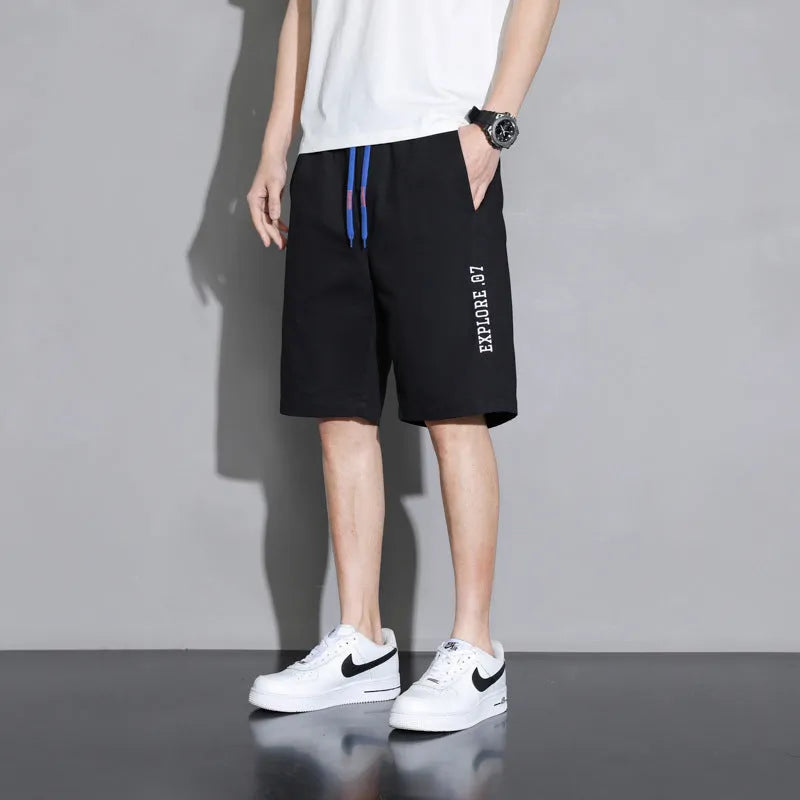 Boys cotton shorts in black, khaki and white colours showing mid waist design and shorts length
