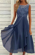 Women's sleeveless chiffon dress with lace hollow-out detail in princess style, shown in green colour