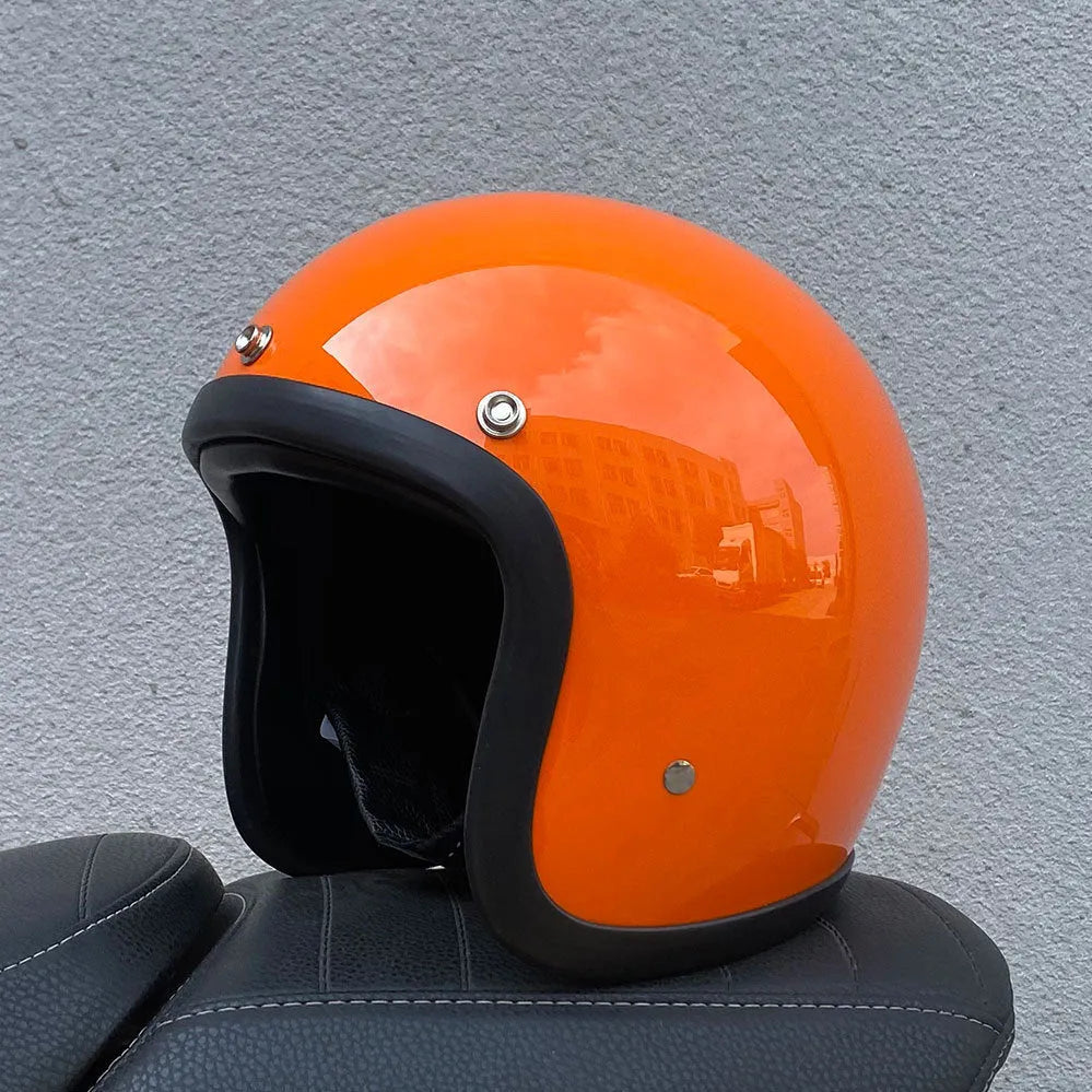 Glass fibre retro motorcycle half helmet shown in cement grey colour on size M