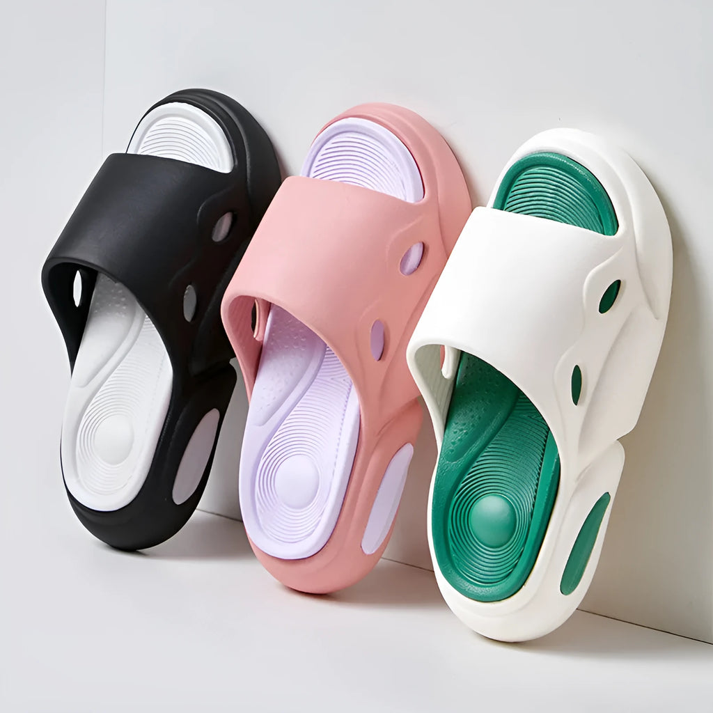 Women's and men's two-colour thick-soled EVA slippers with leather lining in pink purple, white green, or black white colour options.
