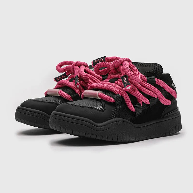 Unisex casual lace-up shoes with thick rubber soles in denim blue colour showing round toe and low-top design