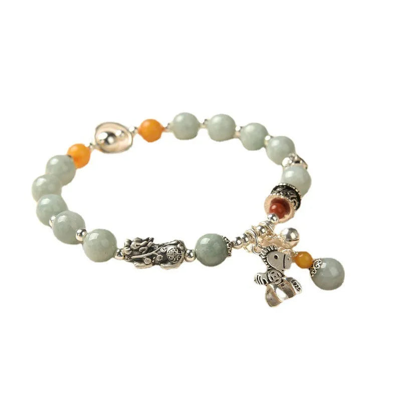 Natural emerald jade vintage bracelet with alloy fittings and retro styling