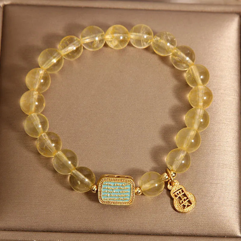 Women's citrine yellow crystal bracelet with rhinestone decorative elements