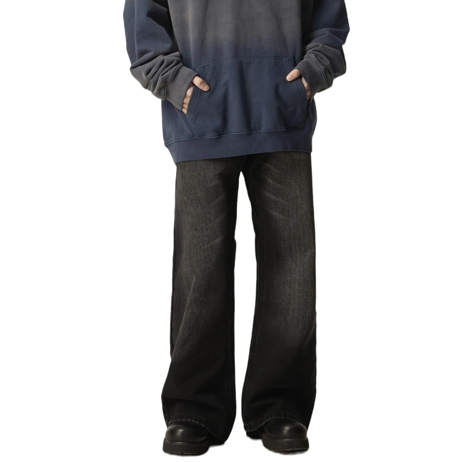 Black loose-fit straight-leg retro jeans with a zipper fly on a mannequin.