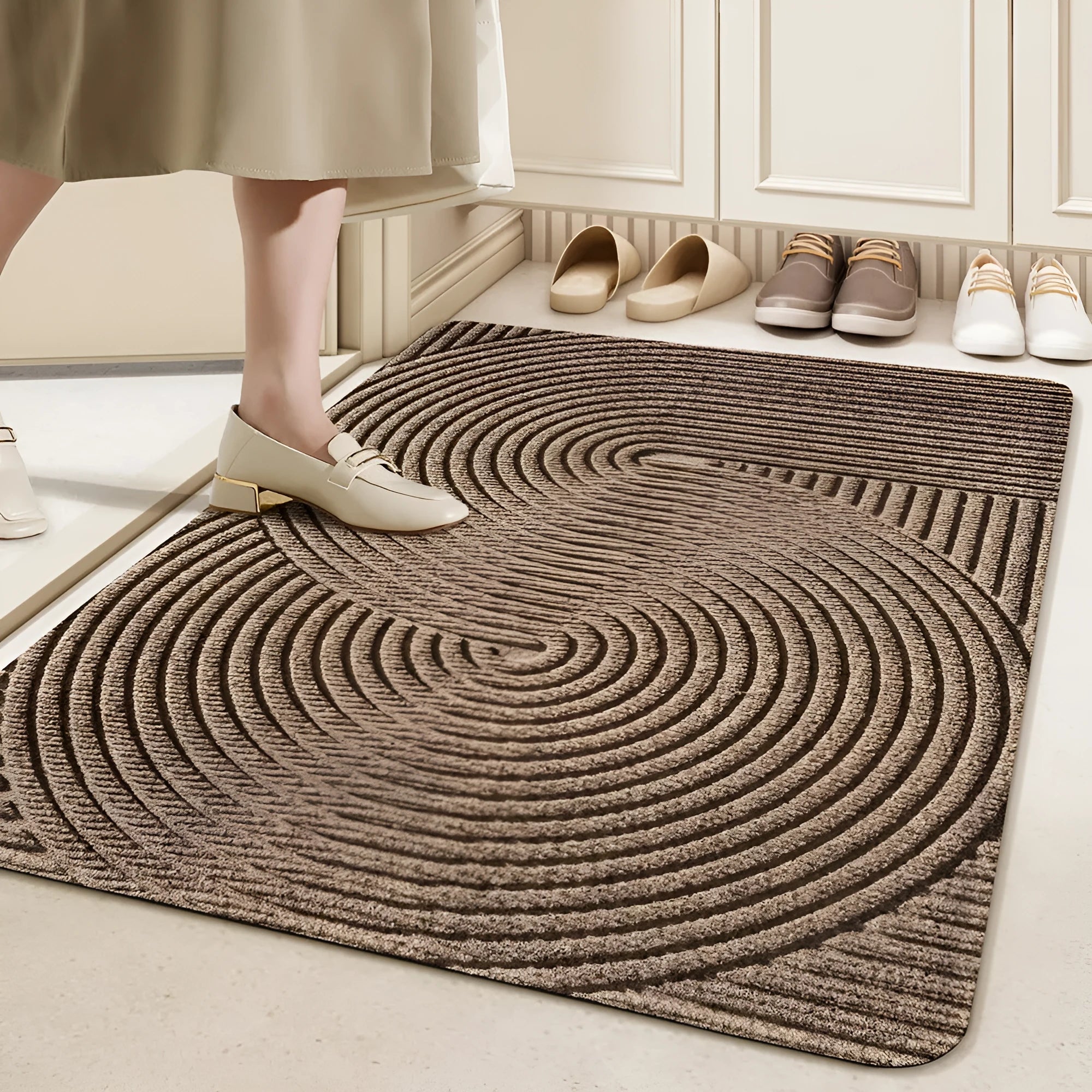 Green diatom earth entrance floor mat with alien shape, wire ring border, and cartoon anime pattern.