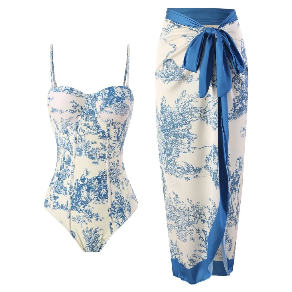 Blue women's one-piece swimsuit with matching gauze skirt on size chart