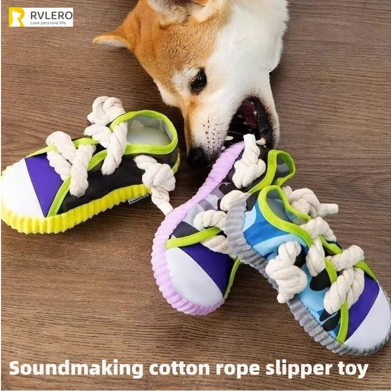 Realistic shoe-shaped dog toy in grey, purple, or yellow with laces, sole patterns, built-in squeaker and bell.