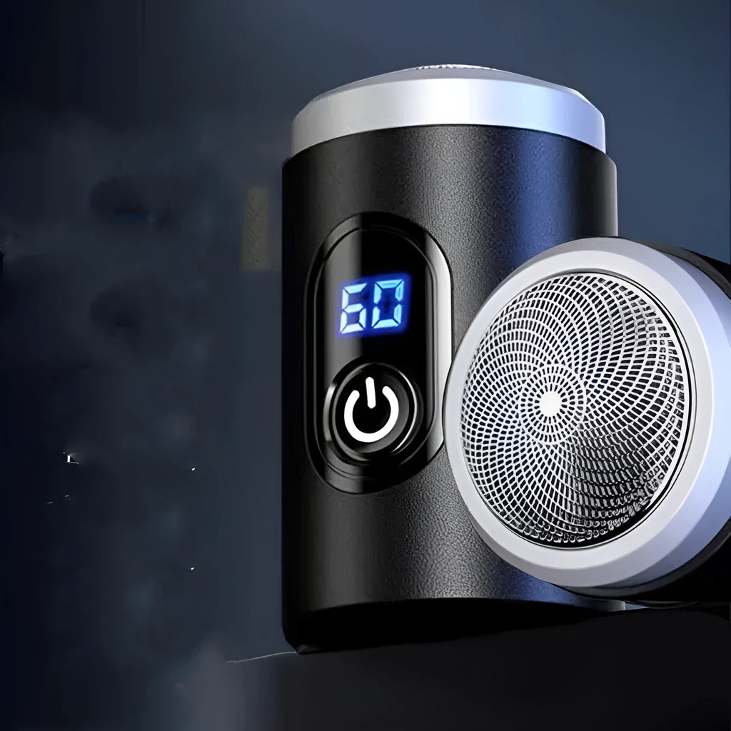 Black mini USB rechargeable shaver with cleaning brush and cable on white background