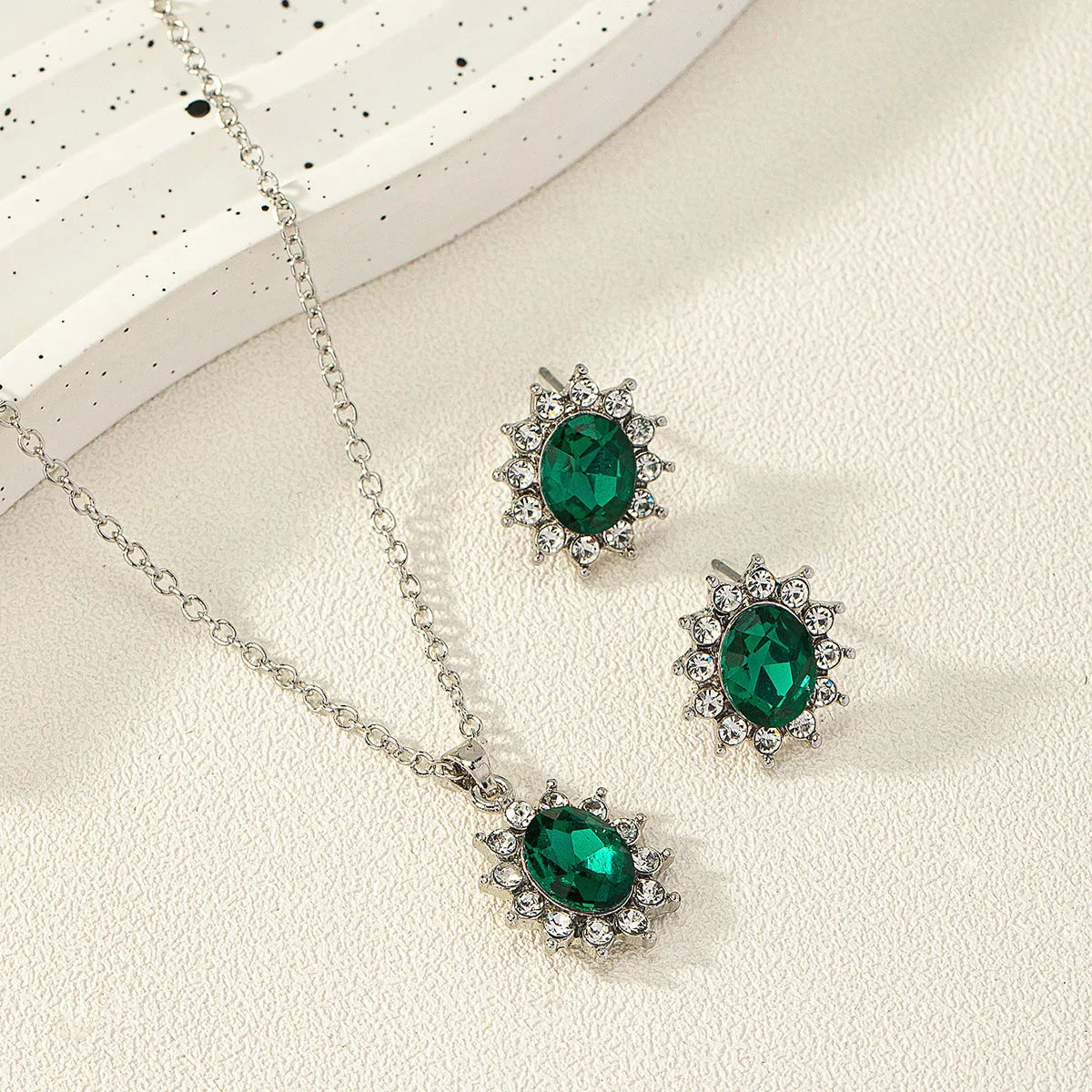 Alloy necklace and earring set with elliptical zircon elements in electroplated colours