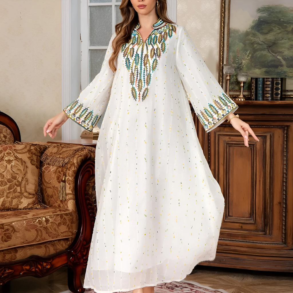 White Arabic robe for women with long sleeves and a floor-length skirt.