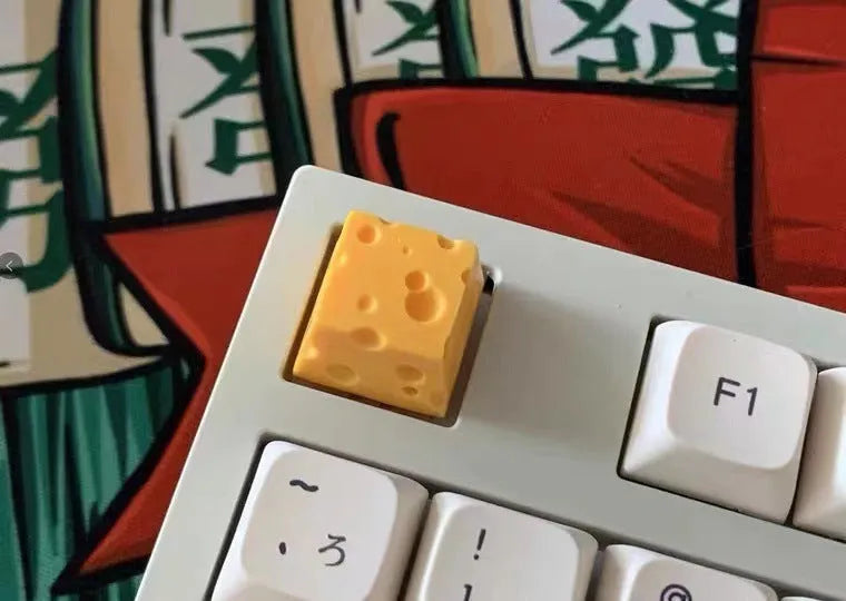 Yellow resin cheese artisan keycap for mechanical keyboards with Cherry MX compatibility