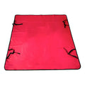 Grey cloth car pet mat with dog footprint print covering a car rear seat.