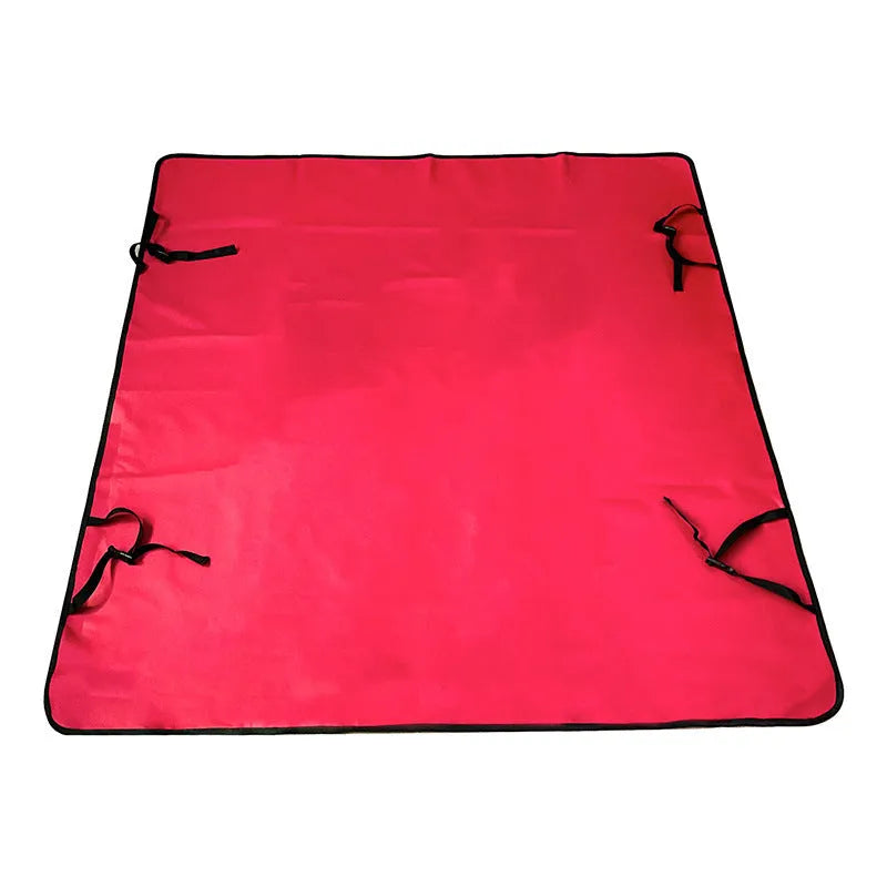 Grey cloth car pet mat with dog footprint print covering a car rear seat.