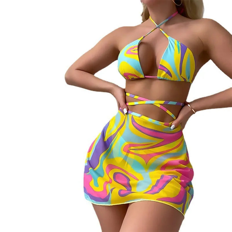Yellow striped halter neck swimsuit set with lace-up front, skirt, and shorts for women