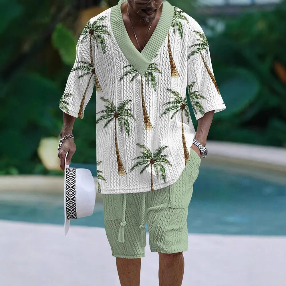 Man wearing a loose-fitting short sleeve top and matching casual shorts from a polyester suit set.