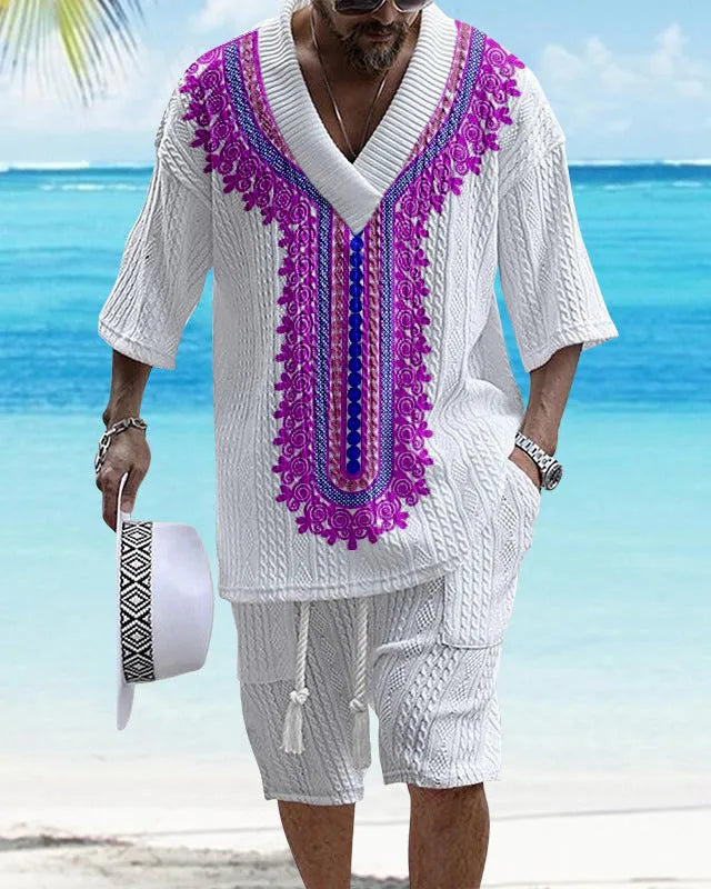 Man wearing a printed drop-shoulder knitted short-sleeve top with matching shorts, a casual summer suit set.