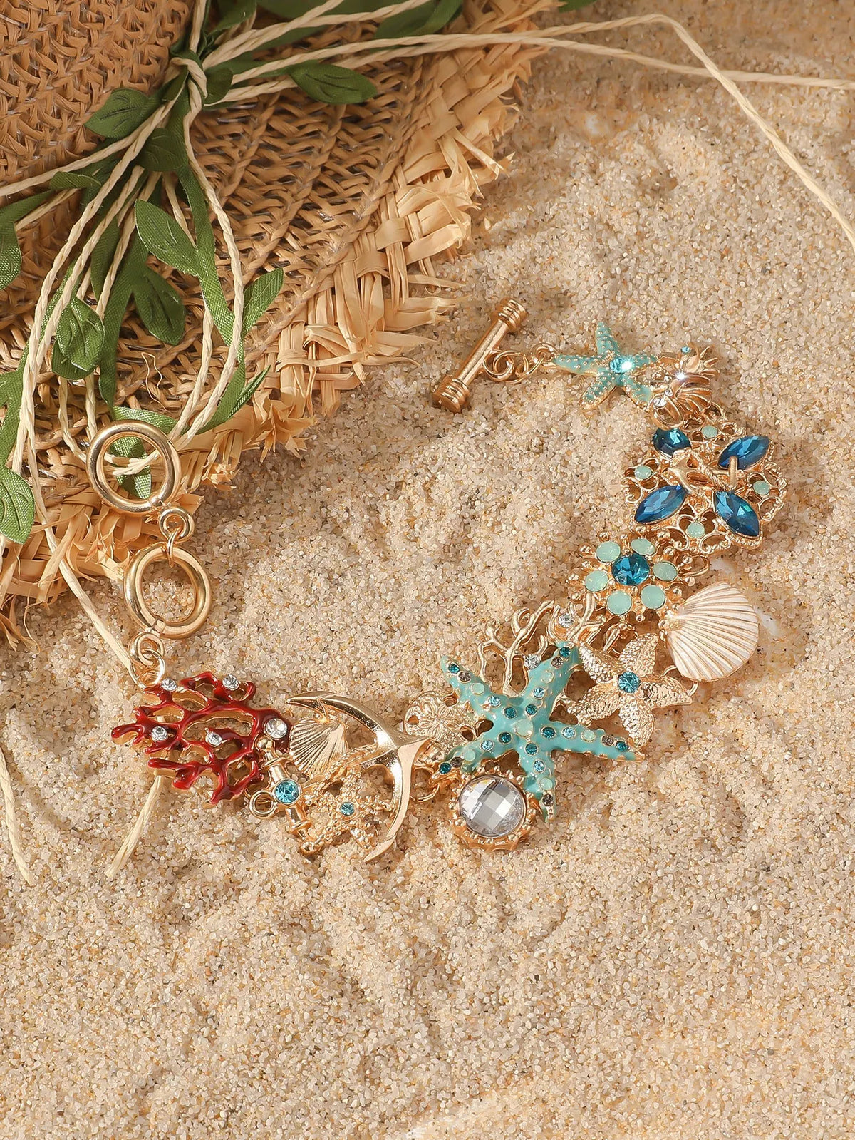 Women's alloy rhinestone bracelet featuring marine anchor and starfish design in coastal colours