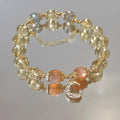 Women's Chinese-style crystal bracelet with 14K gold electroplated finish and diamond-shaped citrine moon design