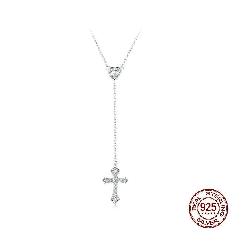 Silver V-neck Love Cross pendant on an O-ring chain necklace for women.