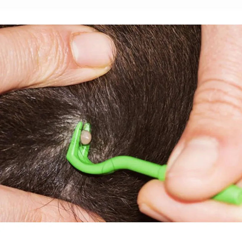 Three blue and green plastic tick removal clips with hook design for pets.