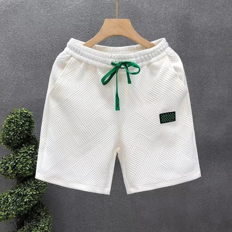 Casual polyester sports shorts with micro elasticity in white, black, or green colours