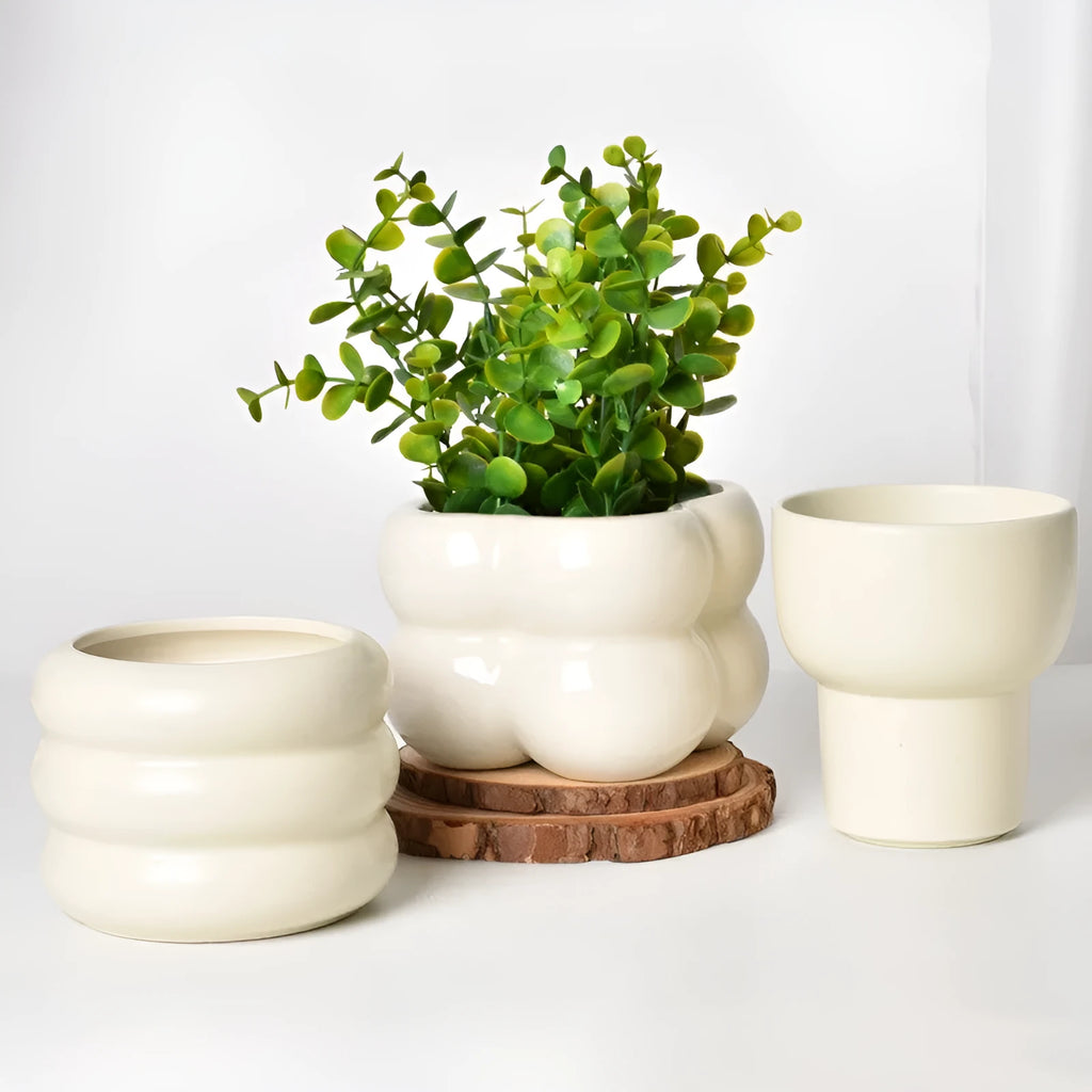 Roman column matte yellow ceramic flower pot with breathable, self-absorbent design.