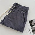 Men's loose straight-leg casual trousers in beige with drawstring waist
