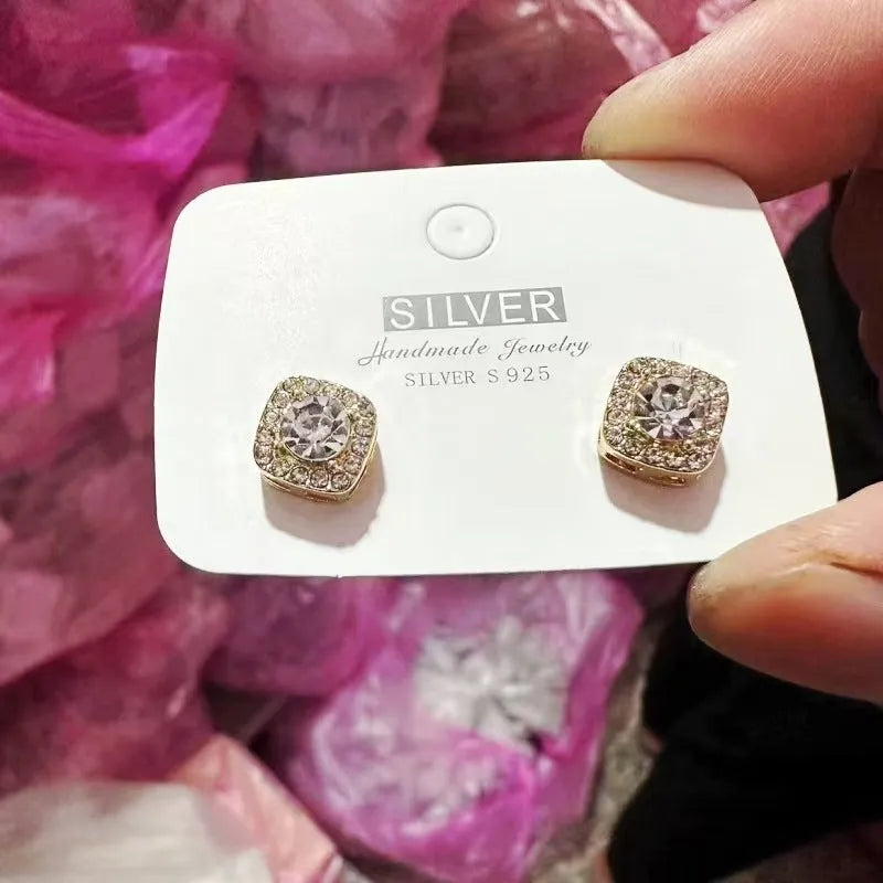Square geometric earrings with diamond treatment in gold and silver alloy options