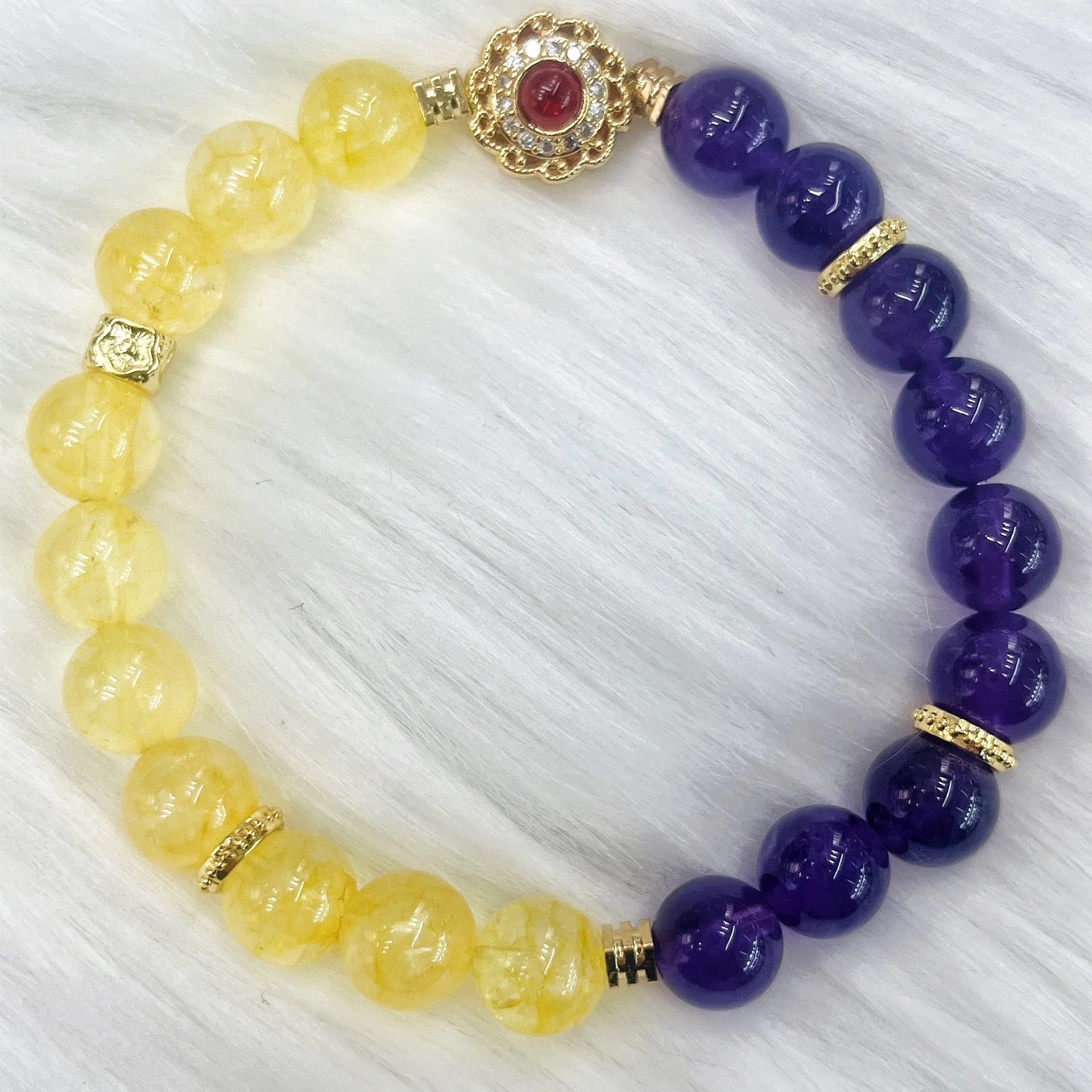 Handmade women's yellow and purple amethyst crystal bracelet with handcrafted details