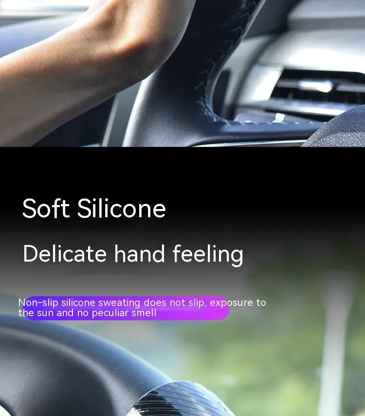 Black steering wheel assist ball with silicone grip and metal bearing mechanism for one-handed vehicle control