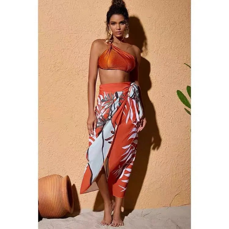 Women's brown high waisted push up bikini swimsuit with a sheer black chiffon dress overlay attached
